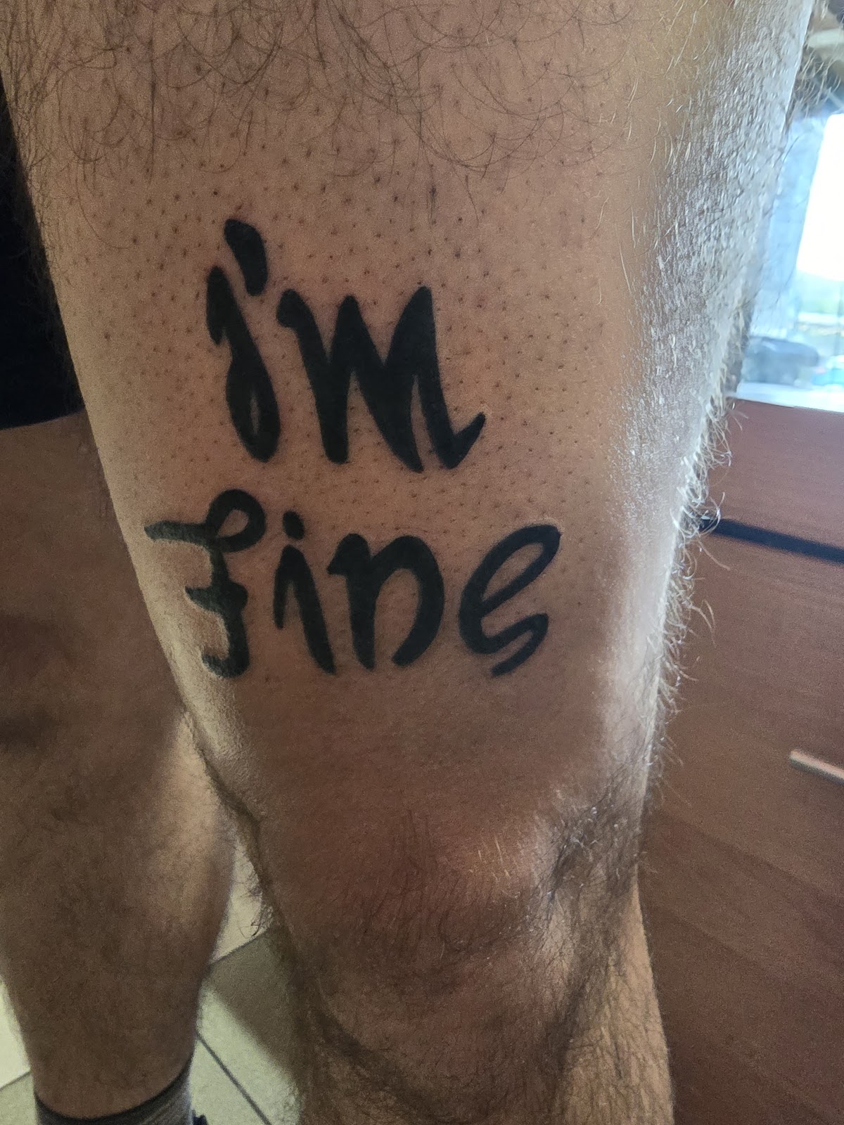 Lettering tatuaż na nodze - KWADART Łódź
